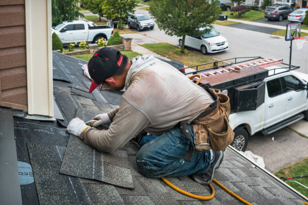 Professional Roofing technician working in Chester, VT